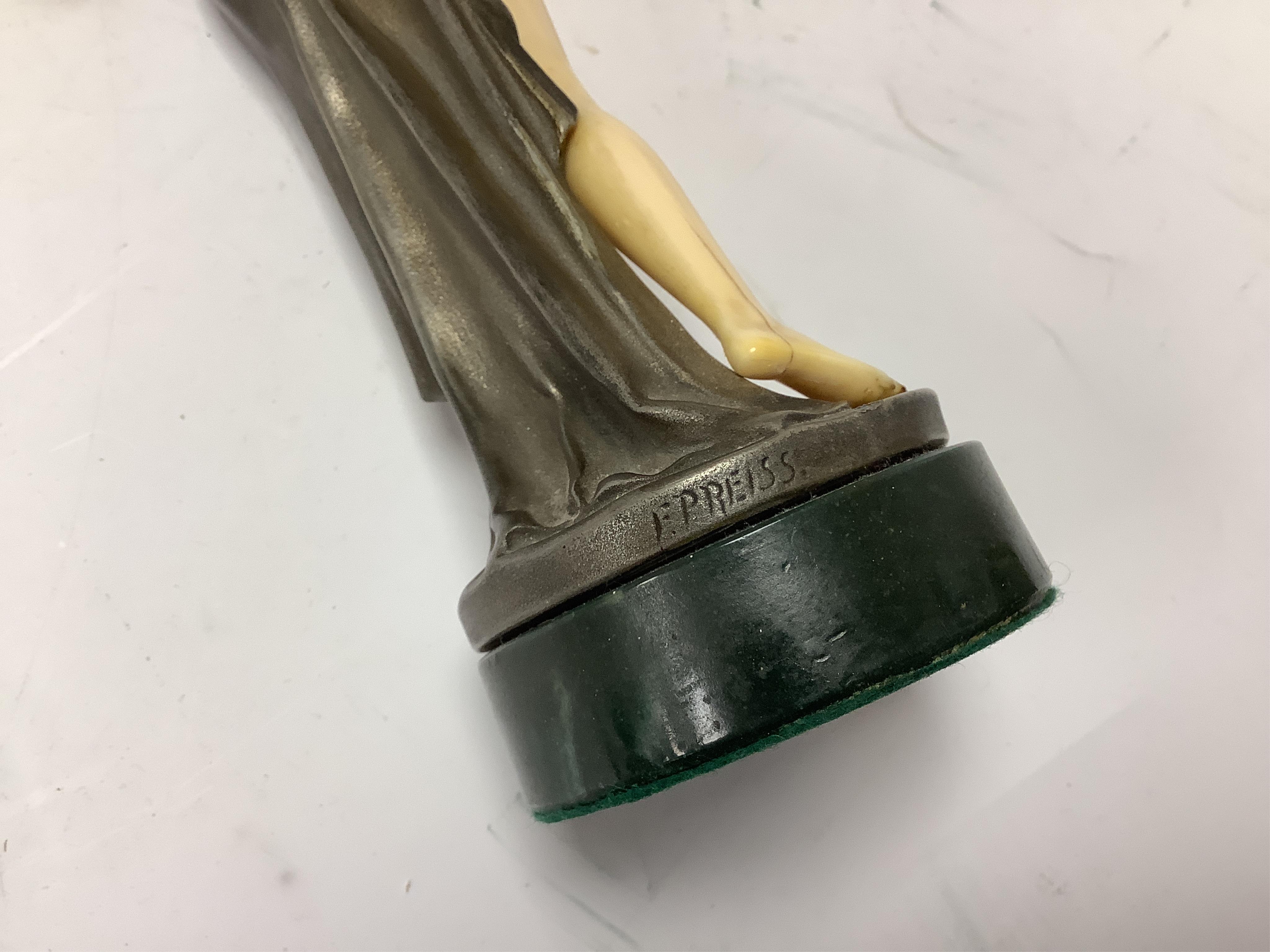 After F. Preiss, an Art Deco style silvered metal and ivorine figure, 'Vanity', 22cm high